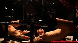 Lezdom Mistress Oversees Submissive Participants