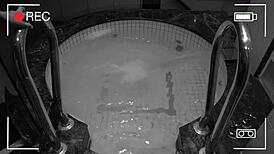Surveillance camera captures unfaithful wife in hotel jacuzzi