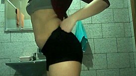 I’m hiding in the bathroom, flashing my pussy again with raw need