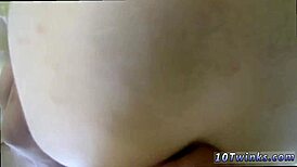 Teen twink masturbates watching gay sex videos