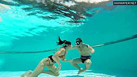 eva sasalka enjoys group underwater fun
