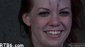 Beauty endures painful clamping on her features in intriguing bondage session