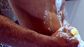 Hey, that twink is really opening up that ass in the shower!