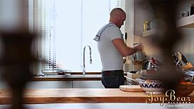 The househusband decides to heat things up in the kitchen with his wife.