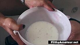 Depraved whore gets milk demijohn in ass.