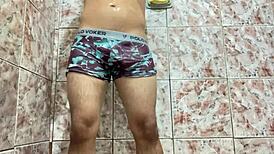 Close-Up Of An Amateur Man Slowly Taking Off His Underwear In A Solo Scene