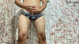 Close-Up Of An Amateur Man Slowly Taking Off His Underwear In A Solo Scene