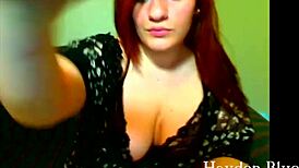 The thick redhead enjoys a relaxing finger session