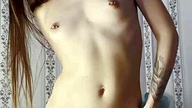 Ki-sim casually rides a huge cock in cowgirl style on the bed.