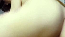 Ki-sim casually rides a huge cock in cowgirl style on the bed.