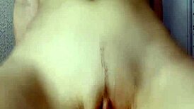 Ki-sim casually rides a huge cock in cowgirl style on the bed.