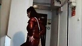 Hey, check out this leather catsuit with pantyhose and miniskirt combo.