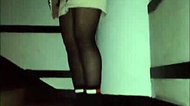 Hey, check out this leather catsuit with pantyhose and miniskirt combo.