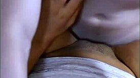 Stressed university student gets relaxing massage from roommate during finals