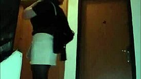 Hey, check out this leather catsuit with pantyhose and miniskirt combo.