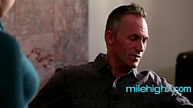 Brunette student teases teacher with blowjob in classroom