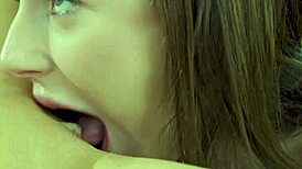 busty brunette licks blonde's shaved pussy then gets strapon fucked