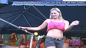 dirty wet t-shirt contest at wild biker rally. raunchy public flashing in outdoor nude party.
