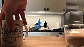 Young amateur wife washes dishes while voyeur camera records