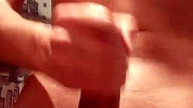 A skinny European teen jerks off a huge cock and cums heavily