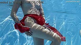mimi cica shows off her tight pussy in swimming pool erotics