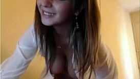 that beautiful camgirl is teasing with her big tits and ass on webcam