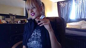 Blonde Sandi Smokes Cigarettes While Squirting on Big Tits