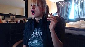 Blonde Sandi Smokes Cigarettes While Squirting on Big Tits