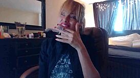 Blonde Sandi Smokes Cigarettes While Squirting on Big Tits