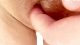 Lonely sexy girl masturbates her wet pussy, craving a big load of cum on her tits.