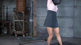 Anally Hooked Slut Endures Brutal Whipping in BDSM Scene.