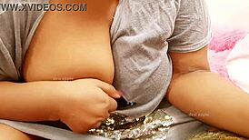 The brother's wife, an indian beauty, shows off her big boobs in the room.