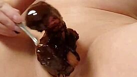 Japanese gay guys cooking up a chocolate banana treat together