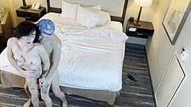 She's bent over, taking rough doggystyle fucking in her tight pussy.