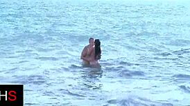 Hey, check this beautiful girl getting fucked hard at the seaside. What a fantastic view!