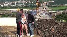 Young blonde cutie banged by two guys in public street threesome