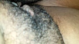 Ebony Lesbian Rubs Hard Clit On Creamy Hole