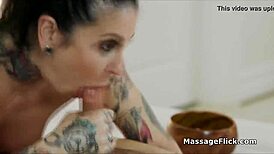 Inked masseuse rides cock with wild enthusiasm.