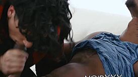 Latino Bodybuilder Armond Rizzo Enjoys Intimate Encounter With Muscular Black Partner