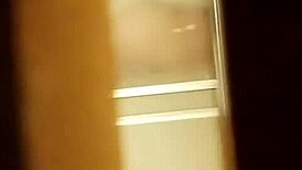 Spying on the hairy pussy shaving