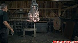 bound sub suspended by her maledom master, ready for rough fetish play?