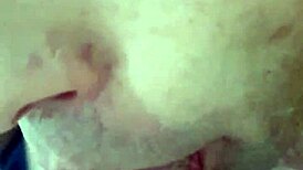 Gay blowjob scene unfolds in a simple encounter.