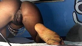 ebony girl fucks asshole with dildo