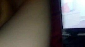 Redhead gives deepthroat blowjob in casual setting.