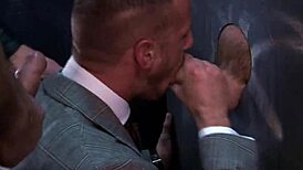 Nasty boys cum through gloryhole in group orgy