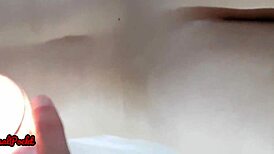 hot candle massage with girlfriend in motel, she enjoys the session