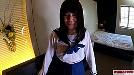 Wow, check out this cute 18-year-old Asian in sailor uniform having her first squirting with 20+ orgasms from fingering and toys!