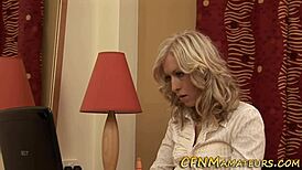 Amateur blonde MILF gives great handjob in CFNM video