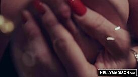 Kelly Madison Shows Boobs While Working on Blueprints