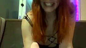 A cam girl rides a toy on webcam